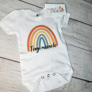 Tiny Miracle Scallop Onesie
